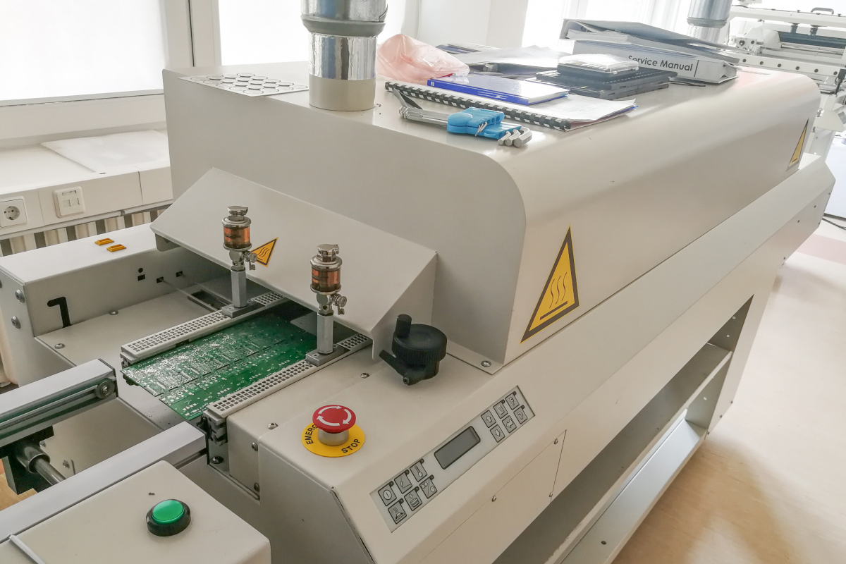 A computer chassis with custom branding being assembled